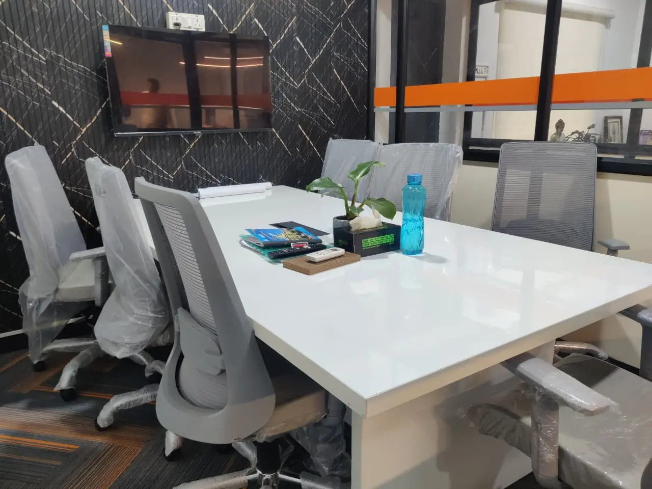 Professional office interior in Chennai with glass partitions for corporate and startup offices