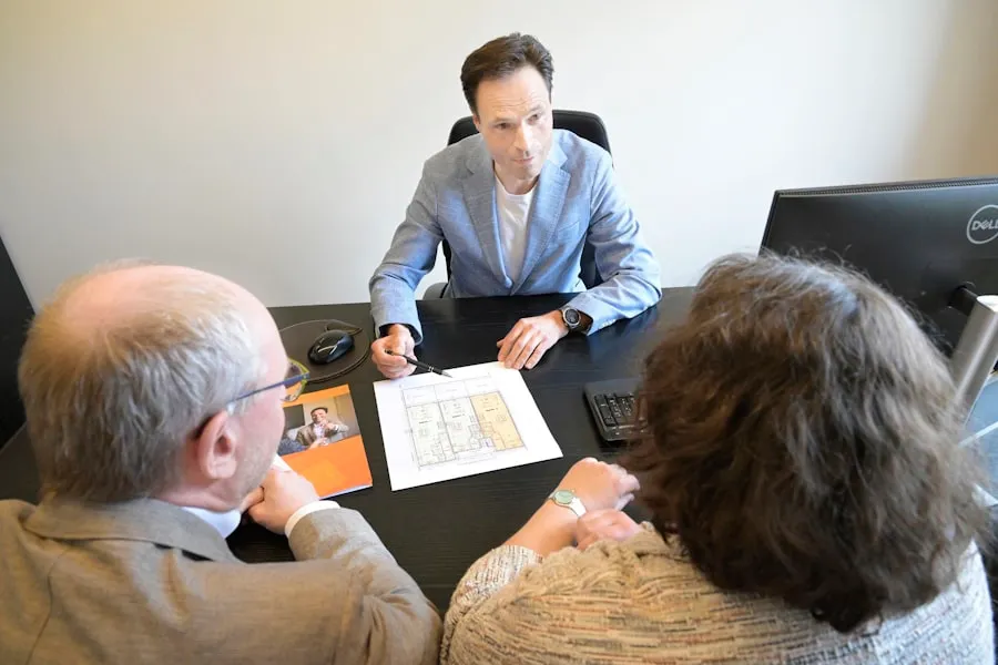 Interior design consultant explaining a commercial space plan to clients
