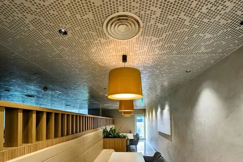 Acoustic control false ceiling for quiet office workstations