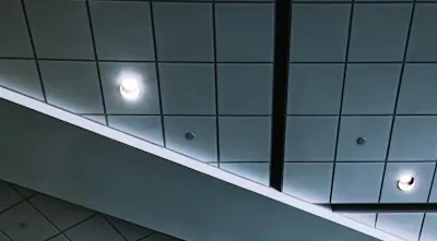 Acoustic mineral fiber tile ceiling for large commercial spaces