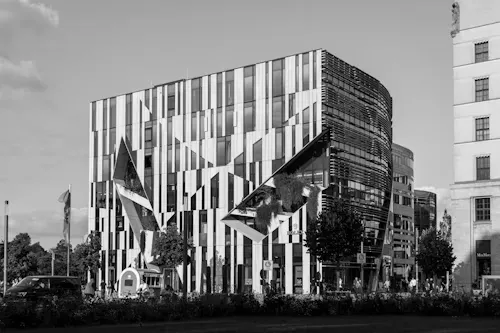 Frameless glass facade for modern office shop fronts